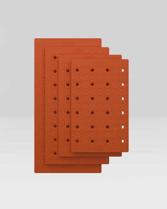 Cushy Ride Kennel Pad all sizes stacked, Orange